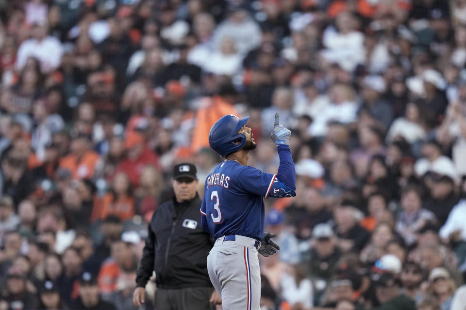 Texas Rangers' Leody Taveras reacts after hitting an RBI single against the San Francisco Giants during the fourth inning of a baseball game Saturday, Aug. 12, 2023, in San Francisco. (AP Photo/Godofredo A. Vásquez)