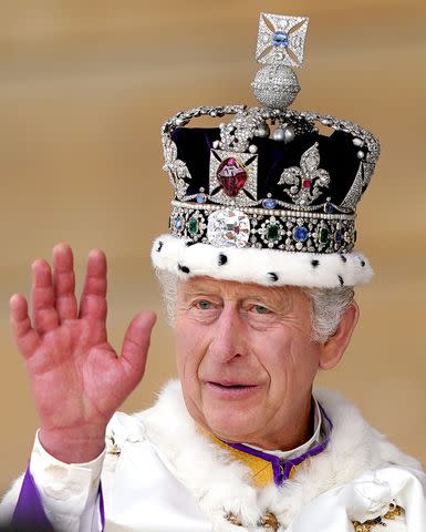 ANDREW MILLIGAN/POOL/AFP via Getty King Charles wearing the Imperial State Crown