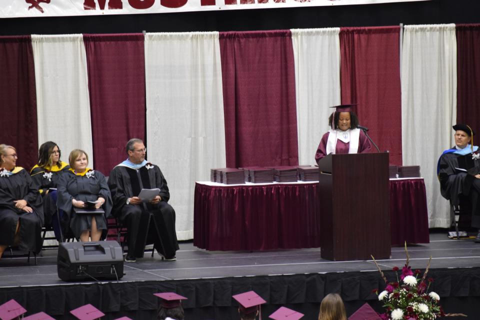 Rashida Smith, a 2022 graduate, addresses her class during the Salina Central High School commencement Sunday. Smith spoke of how proud she was to be alongside a resilient group of students.