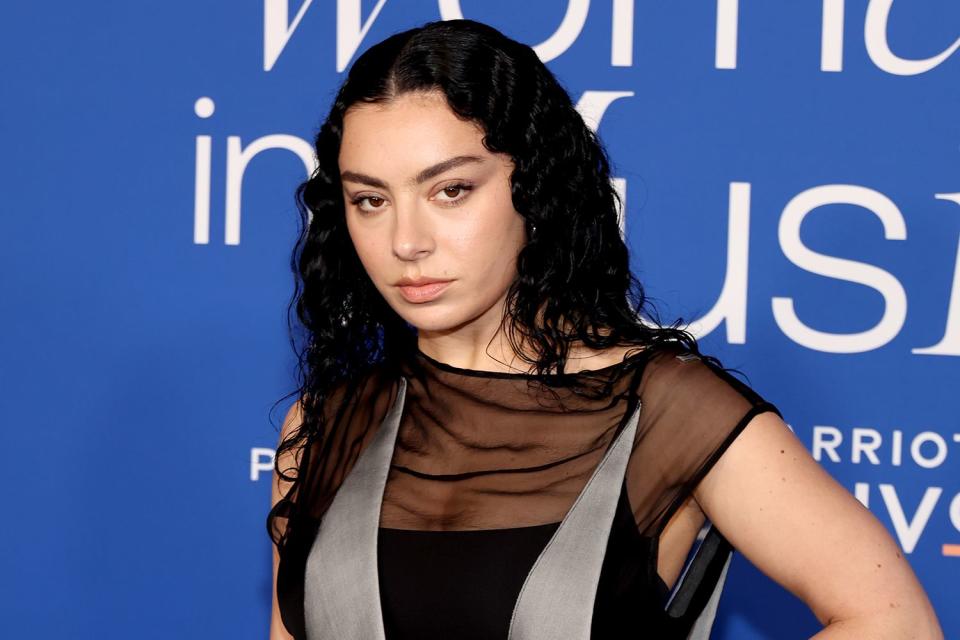 <p>Amy Sussman/Getty</p> Charli XCX attends the 2024 