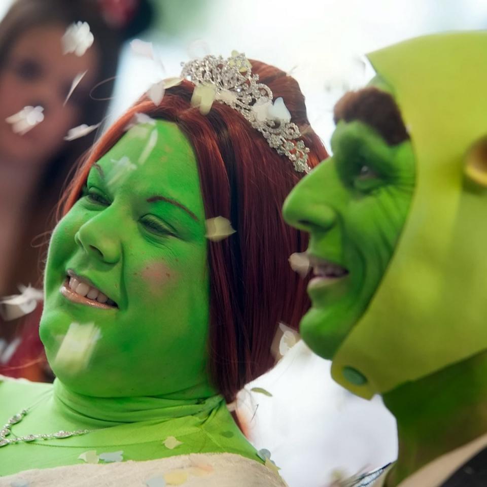 <div class="caption-credit"> Photo by: SWNS</div>For these newlyweds, it's easy being green.