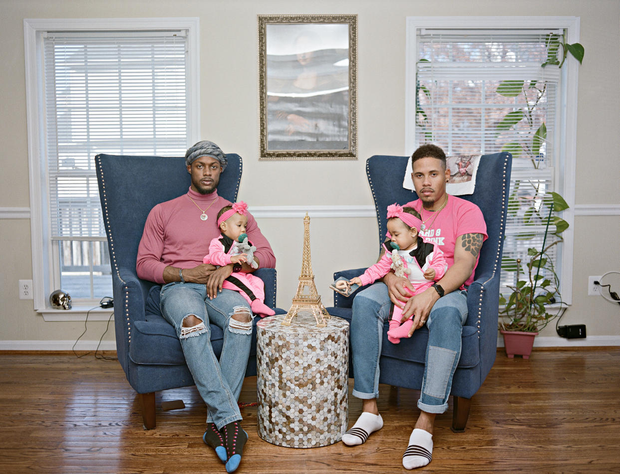 Vernon and Ricardo with their twin girls at home in Clinton, Md. (Bart Heynen)