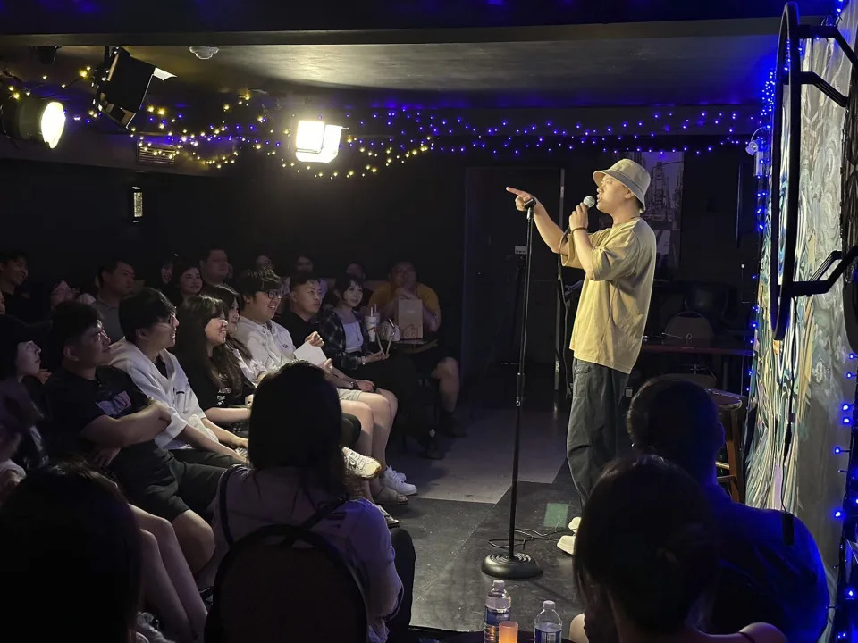 In this photo provided by comedian Lin Dongxiao, who uses the stage name Guazi, Lin performs standup in Toronto, Saturday, June 10, 2023. Lin moved back to China to pursue a career in standup comedy. (Courtesy of Lin Dongxiao via AP)