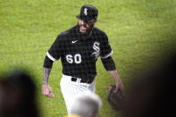 Chicago White Sox starting pitcher Dallas Keuchel reacts as he walks to the dugout during the sixth inning of a baseball game against the Toronto Blue Jays in Chicago, Thursday, June 10, 2021. (AP Photo/Nam Y. Huh)