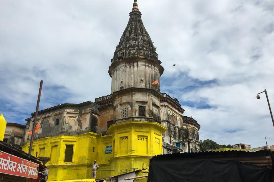 A policeman stands guard on a roof before the arrival of India's Prime Minister to participate in the groundbreaking ceremony of the Ram Temple in Ayodhya on August 5, 2020. - India's Prime Minister Narendra Modi will lay the foundation stone for a grand Hindu temple in a highly anticipated ceremony on August 5 at a holy site that was bitterly contested by Muslims, officials said. The Supreme Court ruled in November 2019 that a temple could be built in Ayodhya, where Hindu zealots demolished a 460-year-old mosque in 1992. (Photo by Sanjay KANOJIA / AFP) (Photo by SANJAY KANOJIA/AFP via Getty Images)