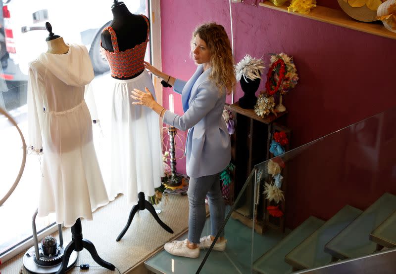 Ukrainian fashion designer from Kyiv sells her creations which represent her national culture, in Madrid