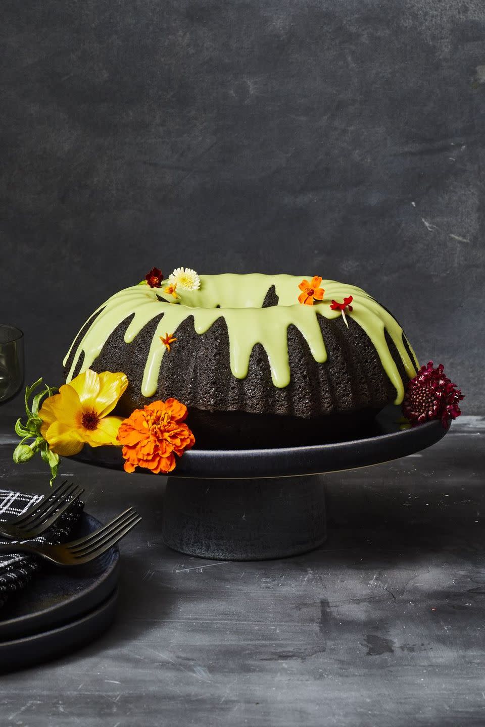 <p>This decadent, chocolatey bundt cake is sure to be the star of your Halloween party. </p><p><em><a href="https://www.goodhousekeeping.com/food-recipes/dessert/a37090798/black-chocolate-cake-recipe/" rel="nofollow noopener" target="_blank" data-ylk="slk:Get the recipe at Good Housekeeping.;elm:context_link;itc:0;sec:content-canvas" class="link ">Get the recipe at Good Housekeeping. </a></em></p>