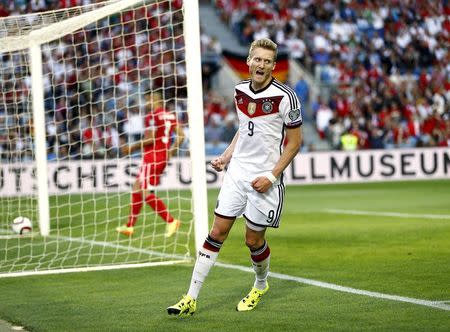 Germany's Andre Schurrle celebrates his goal against Gibralta during their Euro 2016 qualifying soccer match at Algarve stadium in Faro, Portugal, June 13, 2015. REUTERS/Marcelo Del Pozo