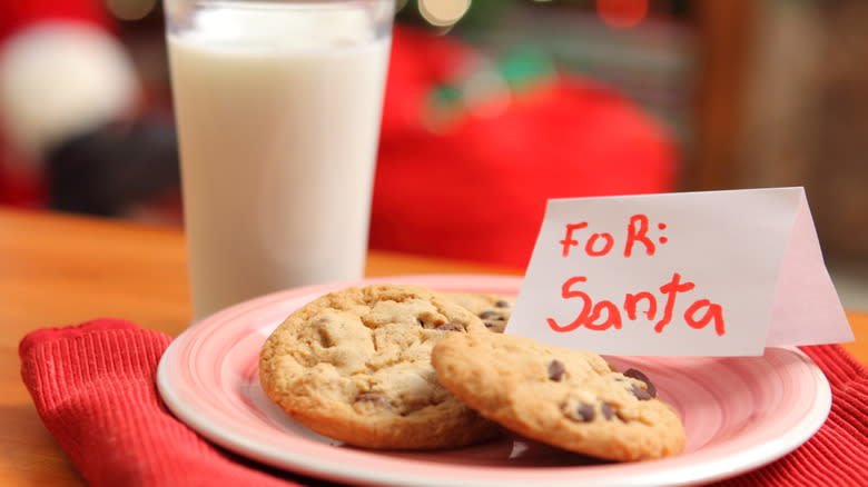 plate of cookies with glass of milk