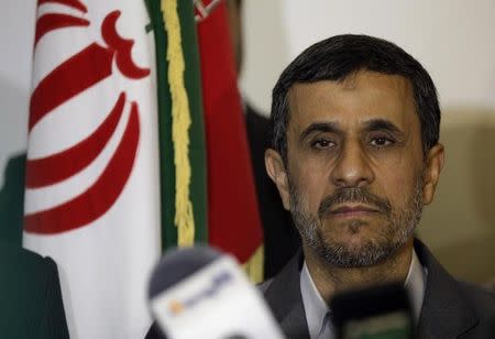 Iran's Mahmoud Ahmadinejad visits Imam Ali shrine in Najaf, Iraq, July 19, 2013. REUTERS/Karim Kadim/Pool