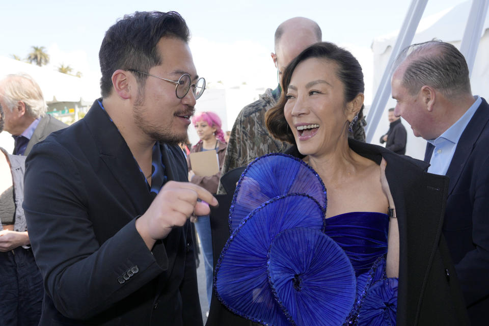 Daniel Kwan, left, and Michelle Yeoh arrive at the Film Independent Spirit Awards on Saturday, March 4, 2023, in Santa Monica, Calif. (AP Photo/Chris Pizzello)