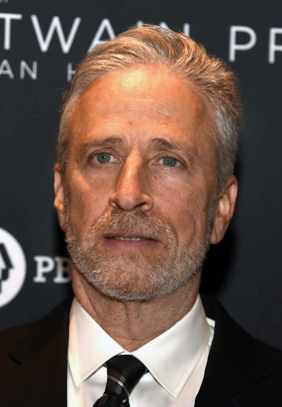 Jon Stewart poses for photographers as he arrives for The Kennedy Center's presentation of the annual Mark Twain Prize for American Humor, in Washington in 2022. File Photo by Mike Theiler/UPI