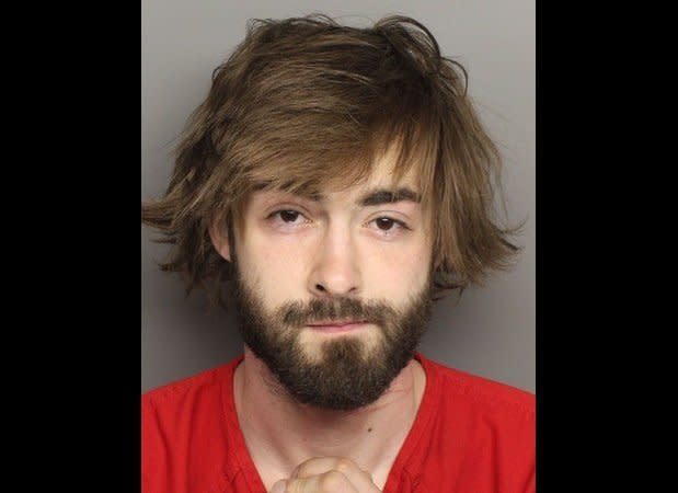 Anthony Michael Hedger, 24, was arrested after authorities in South Carolina saw him walking down a highway naked carrying his 13-month-old son, also naked.