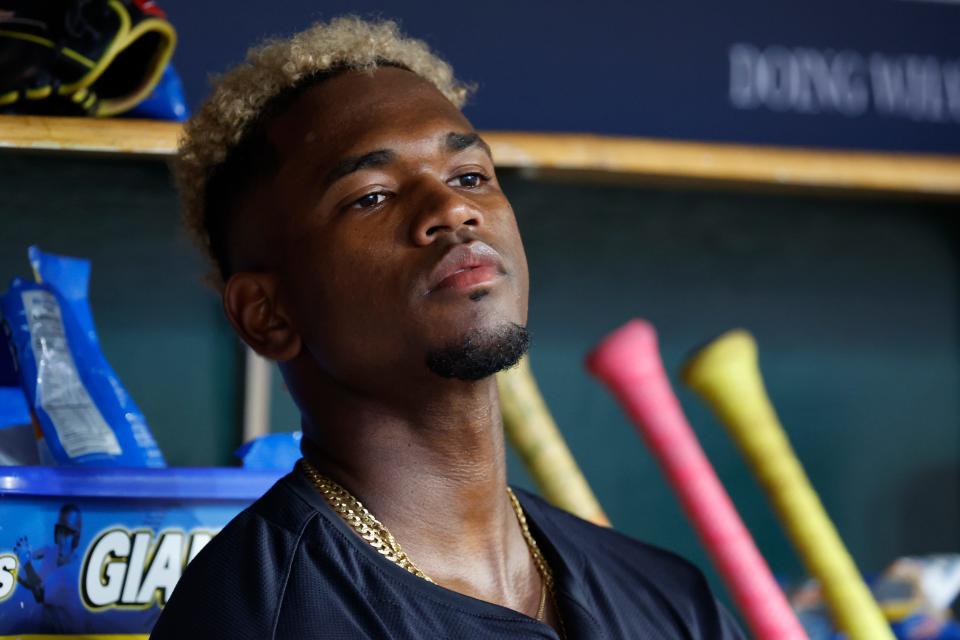 Guardians second baseman Angel Martínez watches from the dugout in the sixth inning against the Tigers, July 10, in Detroit. He says having players like Clase, Ramirez and Noel who also are Dominican in the clubhouse helps a lot.