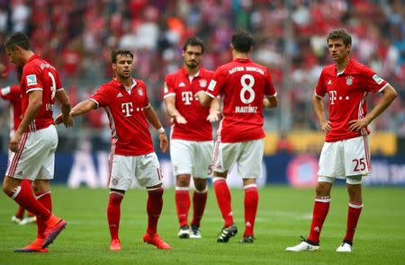 Football Soccer - Bayern Munich v 1. FC Cologne - German Bundesliga - Allianz-Arena, Munich, Germany - 01/10/16 Bayern Munich players react after the match. REUTERS/Michael Dalder.