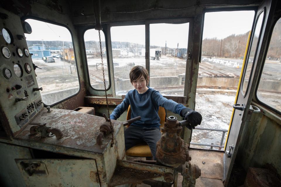 CJ Eichenlaub, 13, plays in a train car at the Port Jervis Transportation History Center.