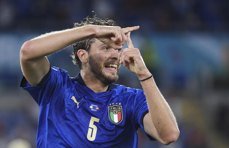 Italy's Manuel Locatelli celebrates after scoring his side's opening goal during the Euro 2020 soccer championship group A match between Italy and Switzerland at Olympic stadium in Rome, Wednesday, June 16, 2021. (Ettore Ferrari, Pool via AP)
