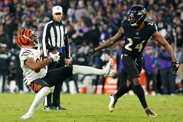 Cincinnati Bengals wide receiver Tyler Boyd (83) runs off the field after  warming up before an