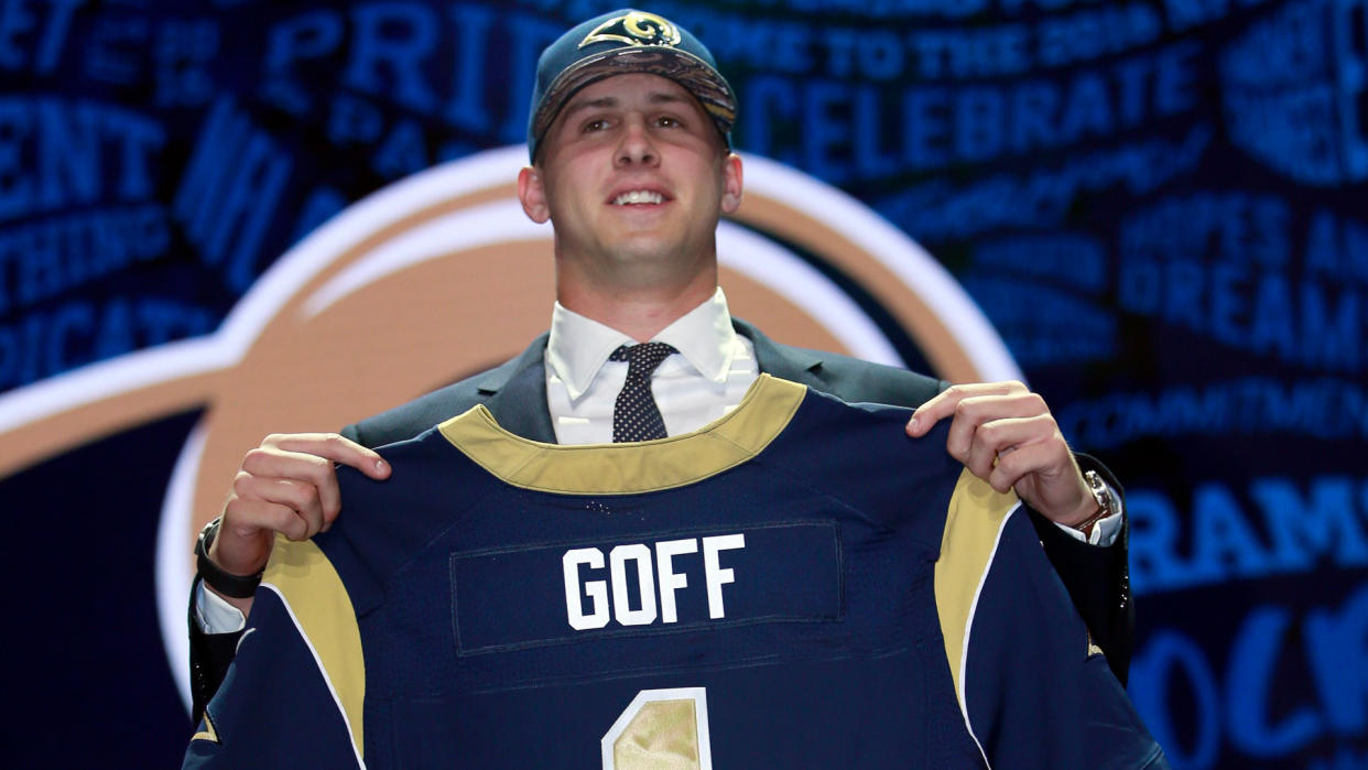 Mandatory Credit: Photo by Jeff Haynes/AP/Shutterstock (9269123bj)California's Jared Goff poses for photos after being selected by the Los Angeles Rams as the first pick in the first round of the 2016 NFL football draft, in Chicago2016 NFL Draft, Chicago, USA - 28 Apr 2016.