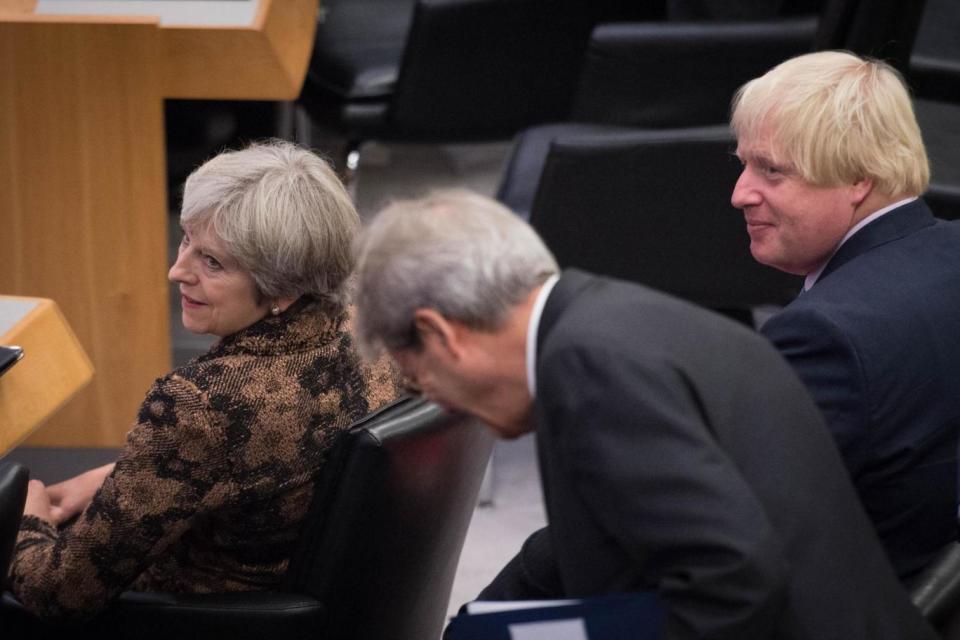 Foreign Secretary Boris Johnson (right) and Prime Minister Theresa May attend a meeting about Libya during the United Nations General Assembly in New York (PA)