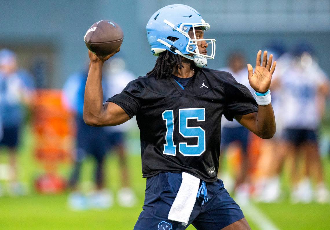 North Carolina quarterback Conner Harrell (15) looks for an open receiver during the Tar Heels’ first practice of the season on Monday, July 29, 2024 in Chapel Hill, N.C.