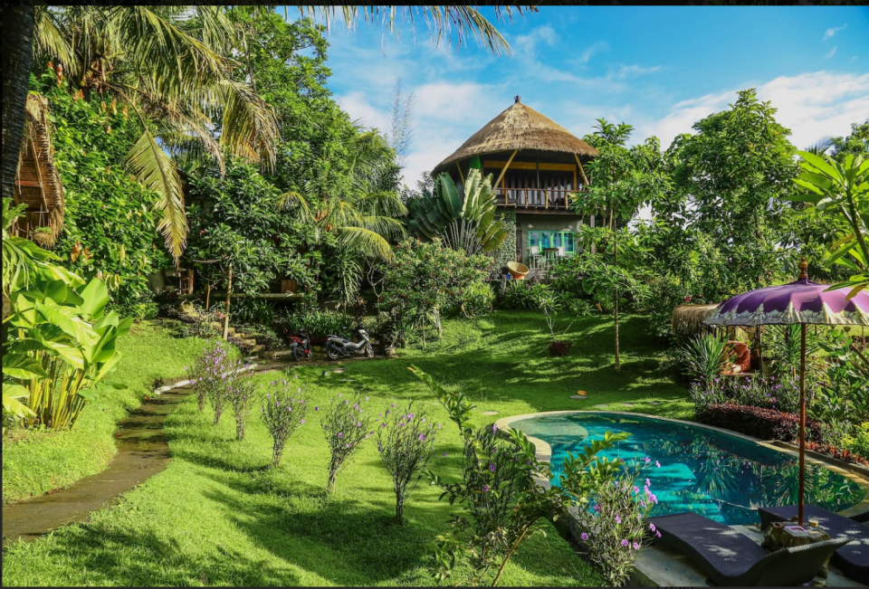 This Balinese treehouse in Denpasar features tropical gardens and a pool. Photo: supplied.