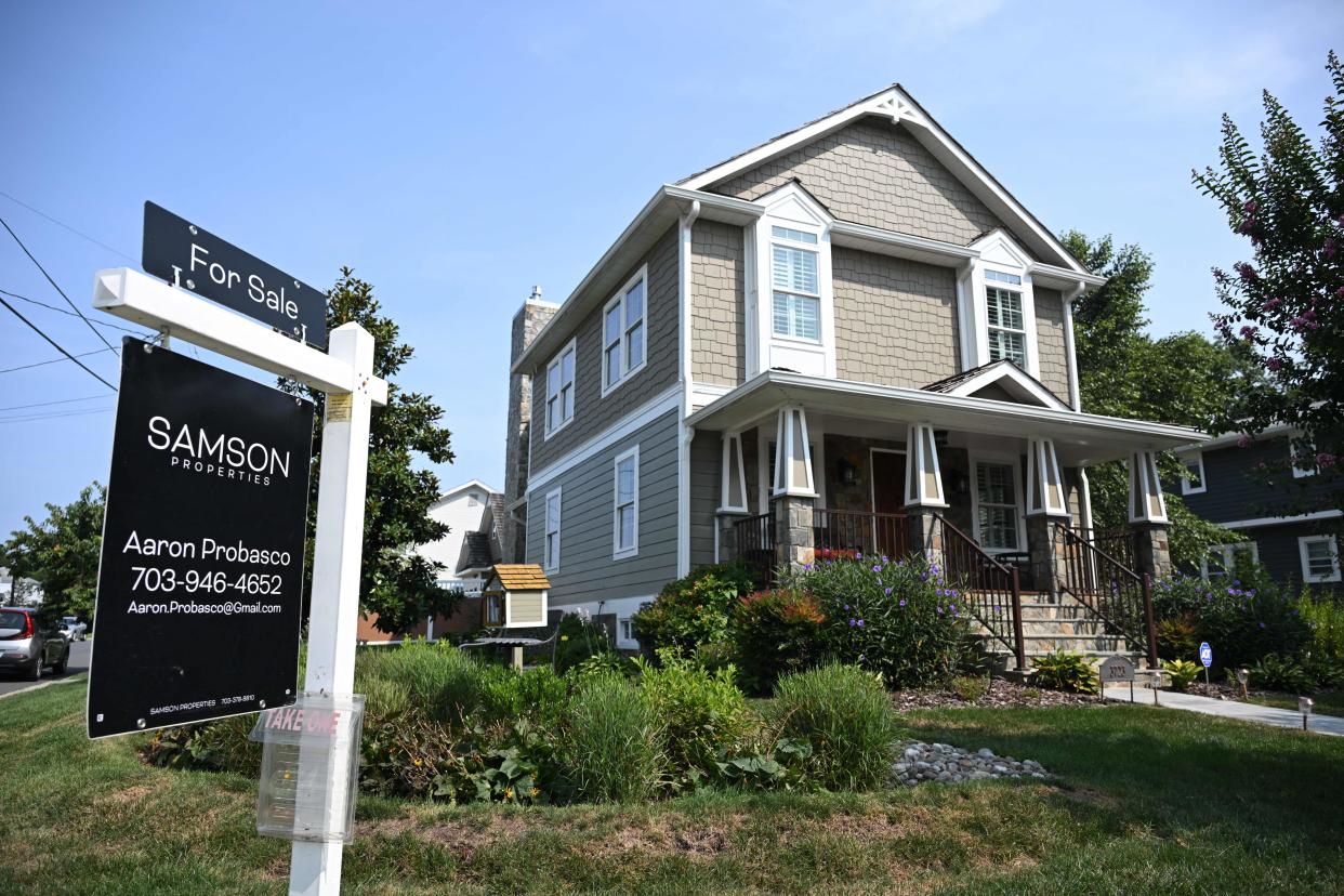 A for sale sign in front of a home in Arlington, Virginia, on August 22, 2023. Sales of homes in the United States ticked down in July, according to industry data released on August 22, 2023, as elevated mortgage rates and limited housing supply held buyers back. The housing market in the world's biggest economy has been reeling as interest rates climbed, making home owners reluctant to put their properties up for sale -- having earlier locked in lower rates on their mortgages. (Photo by Andrew Caballero-Reynolds / AFP) (Photo by ANDREW CABALLERO-REYNOLDS/AFP via Getty Images)