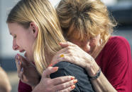 <p>Santa Fe High School student Dakota Shrader is comforted by her mother Susan Davidson following a shooting at the school on Friday, May 18, 2018. Shrader’s friend was shot in the incident. (Photo: Stuart Villanueva/The Galveston County Daily News via AP) </p>