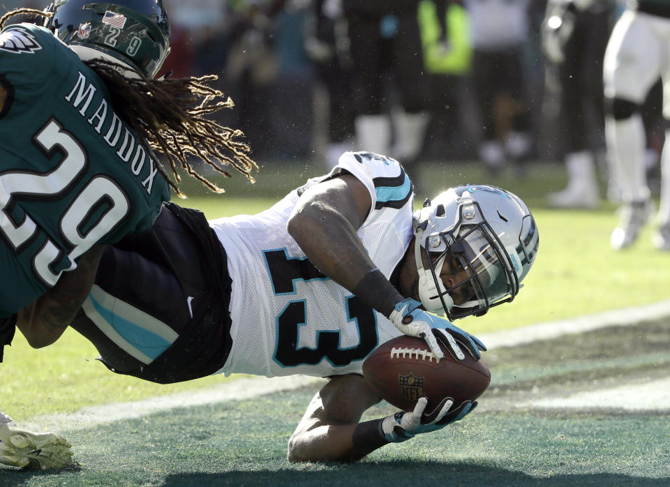 Carolina Panthers wide receiver Jarius Wright (13) dives in for a two-point conversion pass from quarterback Cam Newton, not pictured, as Philadelphia Eagles cornerback Avonte Maddox (29) tries to stop him during the second half of an NFL football game, Sunday, Oct. 21, 2018, in Philadelphia. (AP Photo/Matt Rourke)