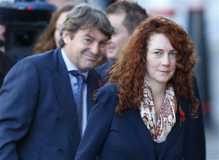 Former News International chief executive Rebekah Brooks and her husband Charlie arrive at the Old Bailey courthouse in London November 4, 2013. REUTERS/Andrew Winning