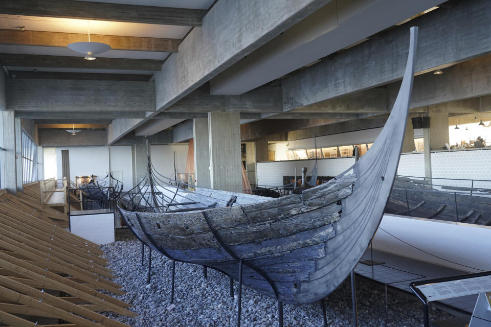 An 11th century, 14-meter Viking coastal trading vessel, sits on display at the Viking Ship Museum. Roskilde, Denmark, Monday, Jan. 17, 2022. For thousands of years, wooden sail boats, best known for having been in use during the Viking-era, allowed the peoples of northern Europe to spread trade, influence and -- in some cases war — across the seas and rivers. In December, UNESCO, the U.N.’s culture agency, added the “clinker’ boat traditions to its list of “Intangible Cultural Heritage,” the result of the first joint nomination from the whole Nordic region. (AP Photo/James Brooks)