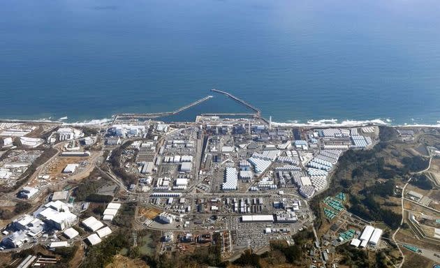 An aerial view shows the storage tanks for treated water at the inactive Fukushima Daiichi nuclear power plant in Japan on Aug. 22.
