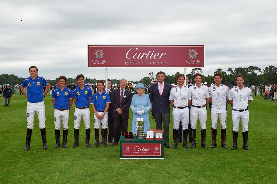 HRH The Queen with Laurent Feniou and the polo players