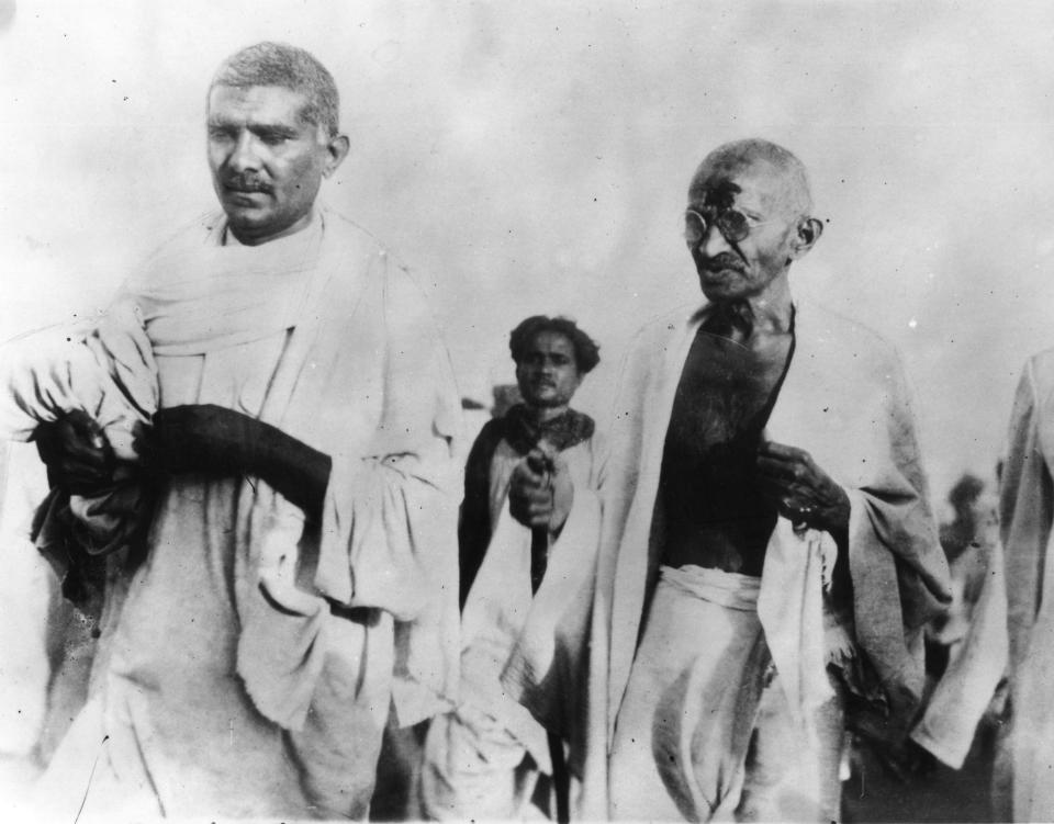 31st March 1930: Pacifist and Indian nationalist leader Mahatma Gandhi (Mohandas Karamchand Gandhi, 1869 - 1948) during the Salt March protesting against the government monopoly on salt production. (Photo by Topical Press Agency/Getty Images)