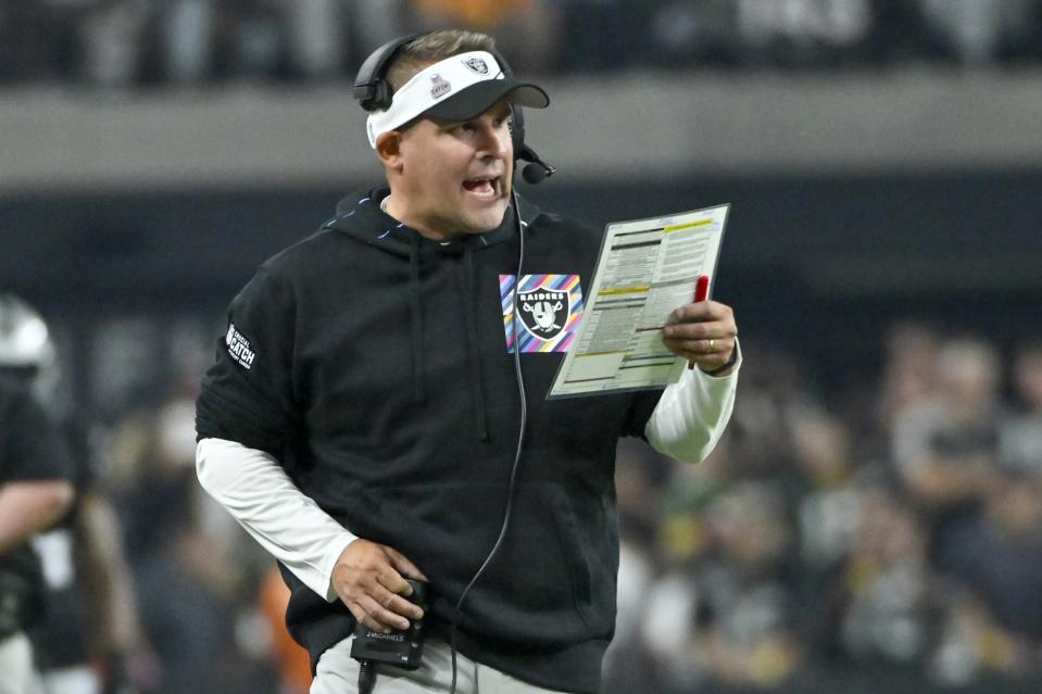 Las Vegas Raiders head coach Josh McDaniels calls a play during the second half of an NFL football game against the Green Bay Packers Monday, Oct. 9, 2023, in Las Vegas. (AP Photo/David Becker)