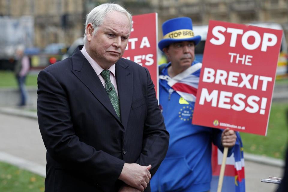 Sky News reporter Adam Boulton attracts the unwanted attention of anti-Brexit campaigner Steve Bray (AFP/Getty Images)