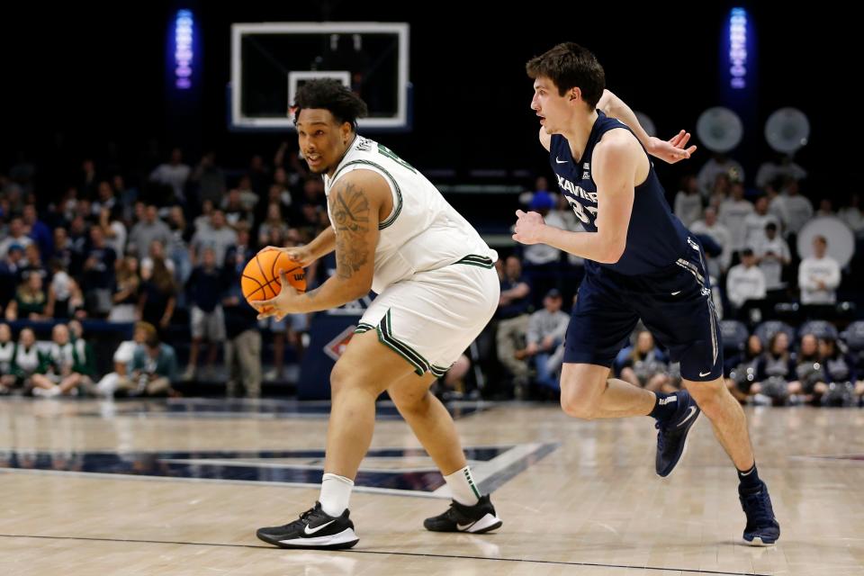 Cleveland State Vikings forward Anderson Mirambeaux looks to move inside against Xavier Musketeers forward Zach Freemantle in the first half of the NIT First Round game at the Cintas Center on March 15, 2022.