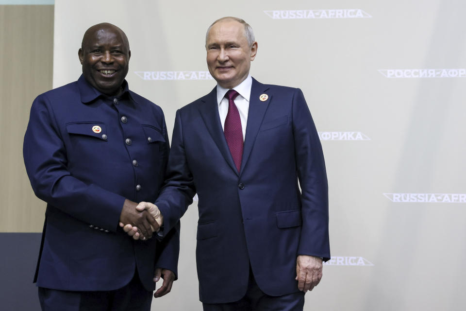 Russian President Vladimir Putin, right, and President of the Republic of Burundi, Evariste Ndayishimiye, shake hands on the sideline of the Russia Africa Summit in St. Petersburg, Russia, Thursday, July 27, 2023. (Mikhail Metzel/TASS Host Photo Agency Pool Photo via AP)