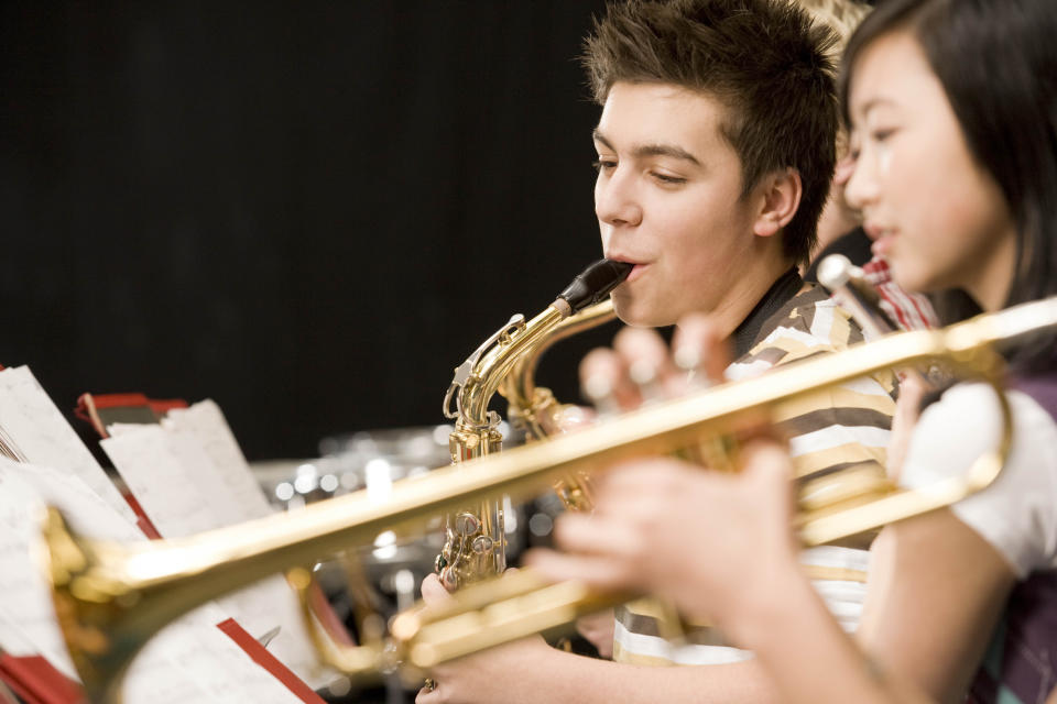 People playing instruments in the marching band