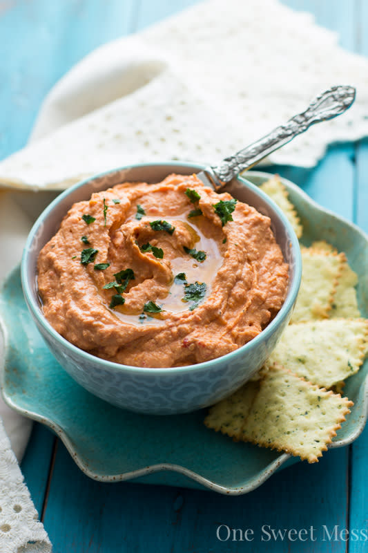 <p>One Sweet Mess</p><p>If you're looking for a dip a bit on the healthier side, this creamy Sun Dried Tomato and Roasted Red Pepper Hummus come together in no time using your food processor. </p><p><strong>Get the recipe: <a href="http://www.onesweetmess.com/2015/06/16/sun-dried-tomato-roasted-red-pepper-hummus/" rel="nofollow noopener" target="_blank" data-ylk="slk:Sun Dried Tomato and Roasted Red Pepper Hummus;elm:context_link;itc:0;sec:content-canvas" class="link rapid-noclick-resp">Sun Dried Tomato and Roasted Red Pepper Hummus</a></strong></p>