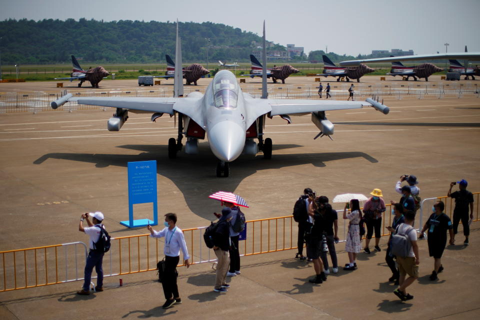 Visitors look at a J-16D electronic warfare aircraft displayed at the China International Aviation and Aerospace Exhibition, or Airshow China, in Zhuhai, Guangdong province, China September 28, 2021. REUTERS/Aly Song