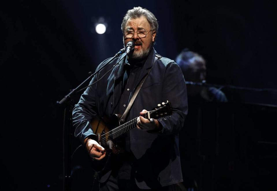 Vince Gill performs with the Eagles in November in Charlotte. On Saturday night, Gill also became the last-minute substitute for Steely Dan as the opening act, doing an acoustic set of his country music hits.