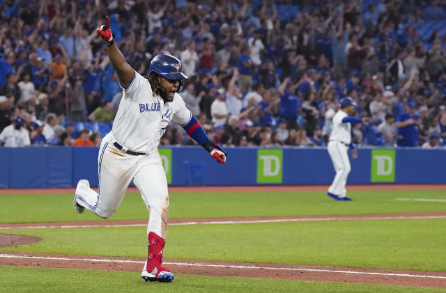 Guerrero homers, hits winning single in 10th, Jays top O's