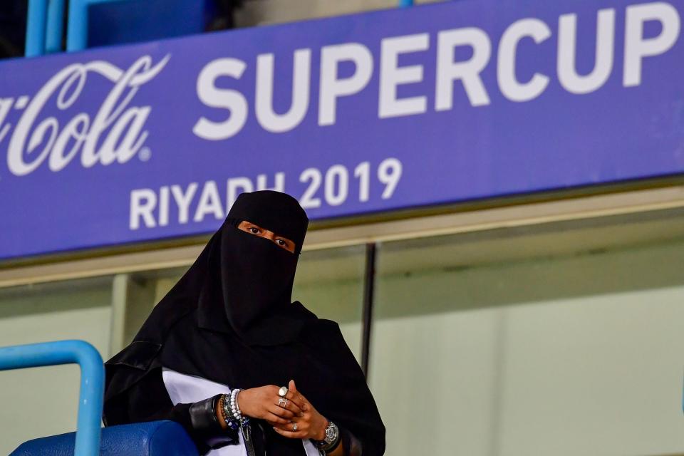 A Saudi woman arrives for the Supercoppa Italiana final football match between Juventus and Lazio at the King Saud University Stadium in the Saudi capital Riyadh on December 22, 2019. (Photo by GIUSEPPE CACACE / AFP) (Photo by GIUSEPPE CACACE/AFP via Getty Images)