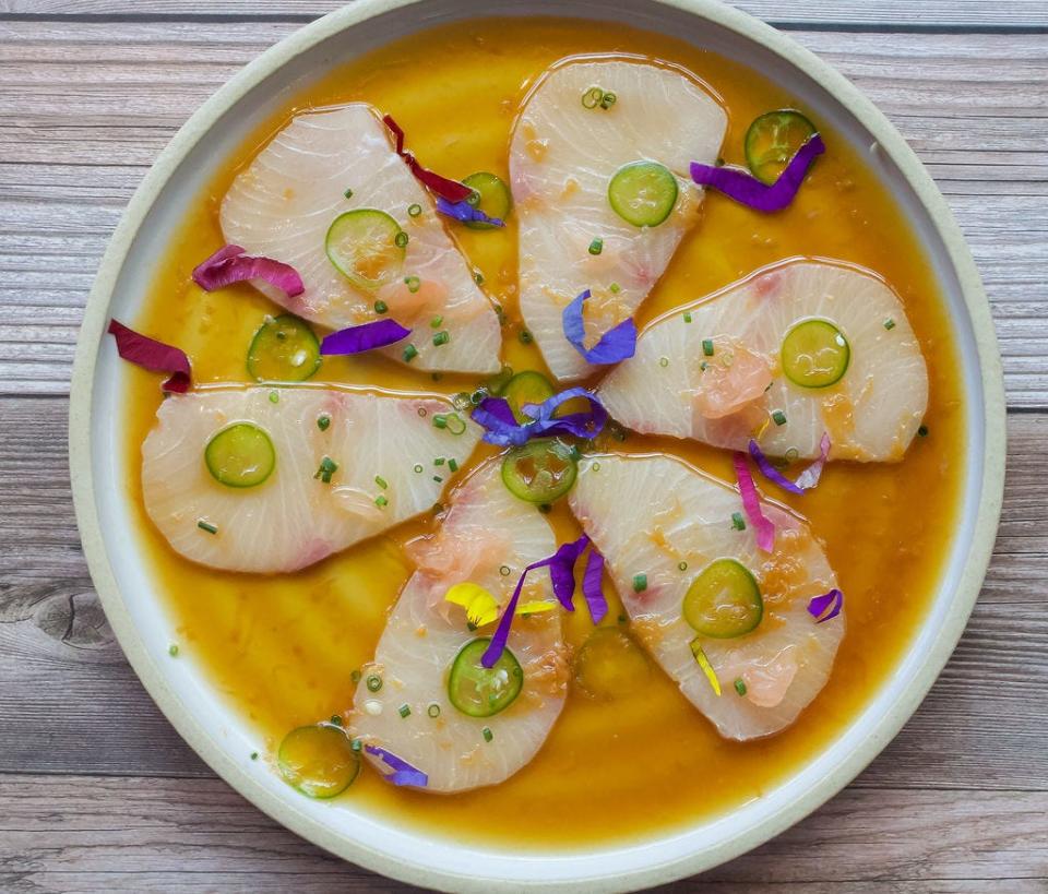 Yellowtail crudo is on the menu at Rosewater Rooftop, located atop The Ray hotel in Delray Beach.