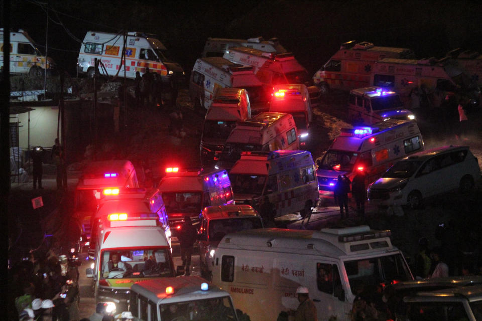 A line of ambulances drive past carrying workers rescued from the site of an under-construction road tunnel that collapsed in Silkyara in the northern Indian state of Uttarakhand, India, Tuesday, Nov. 28, 2023. India’s transportation minister says all 41 construction workers who were trapped in a collapsed mountain tunnel in the country’s north have been pulled out. (AP Photo)