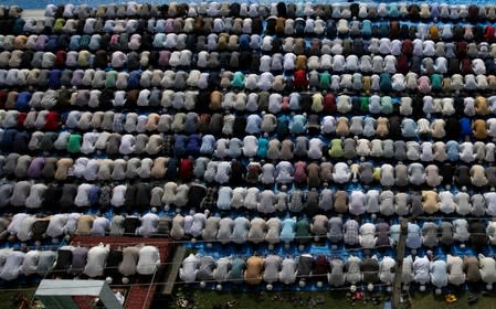 Kashmiris offer Eid-al-Adha prayers at a mosque during restrictions after the scrapping of the special constitutional status for Kashmir by the Indian government, in Srinagar