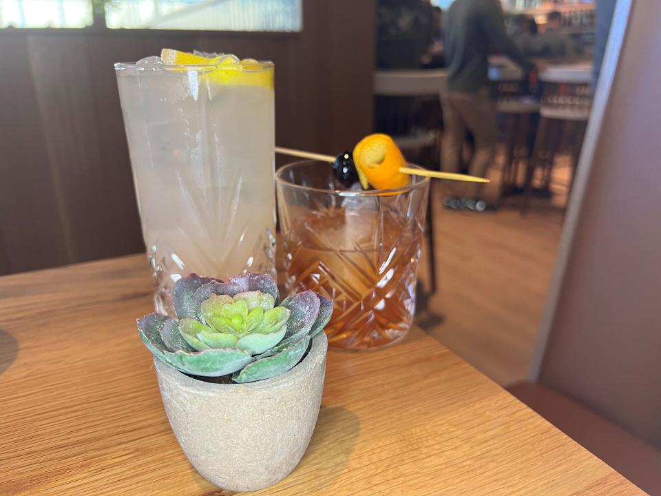 The Debutante, left, a lavender lemonade with Tito's vodka, alongside The Boozy Rooster, Tupelo Honey's riff on a Manhattan.