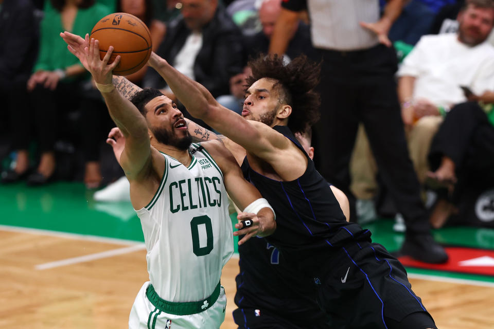 BOSTON, MASSACHUSETTS - JUNE 06: Jayson Tatum #0 of the Boston Celtics shoots the ball against Dereck Lively II #2 of the Dallas Mavericks during the third quarter of the first game of the 2024 NBA Finals at TD Garden on June 06, 2024 in Boston, Massachusetts.  NOTE TO USER: User expressly acknowledges and agrees that by downloading and/or using this photograph, User is agreeing to the terms and conditions of the Getty Images License Agreement.  (Photo by Maddie Meyer/Getty Images)