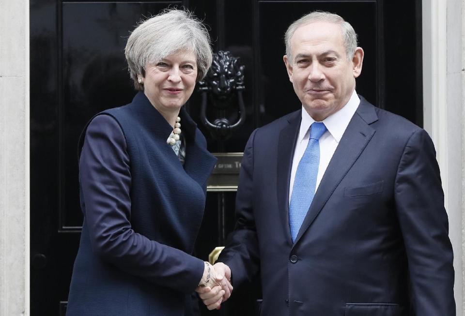 Britain's Prime Minister Theresa May greets Prime Minister Benjamin Netanyahu of Israel at Downing Street in London, Monday, Feb. 6, 2017. (AP Photo/Kirsty Wigglesworth)